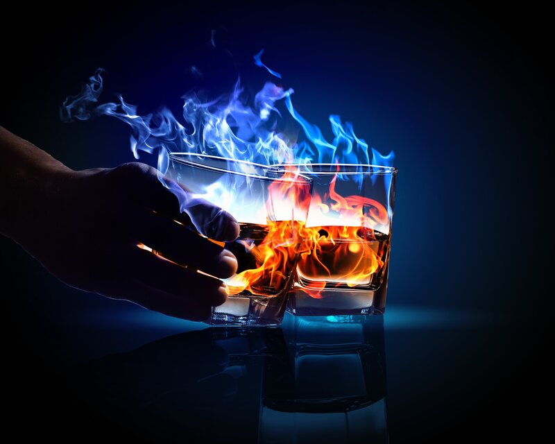 Hand Holding Flaming Glasses — Blue