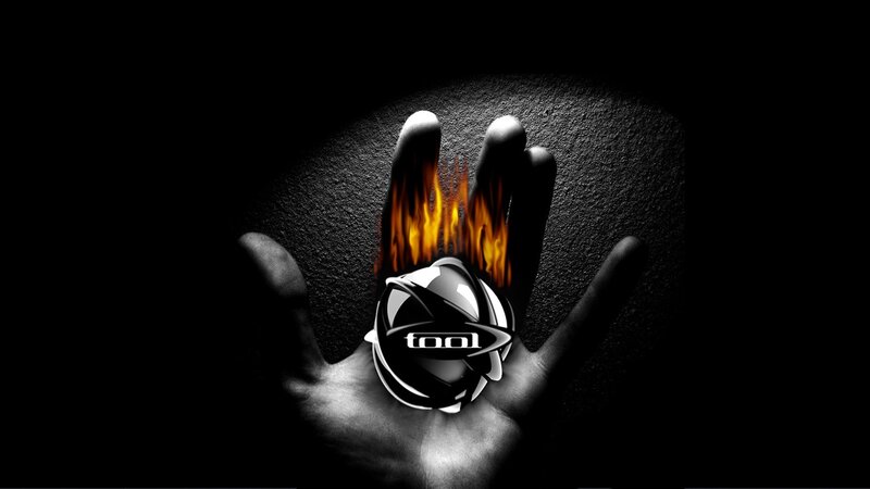 Hand Holding Flaming Object