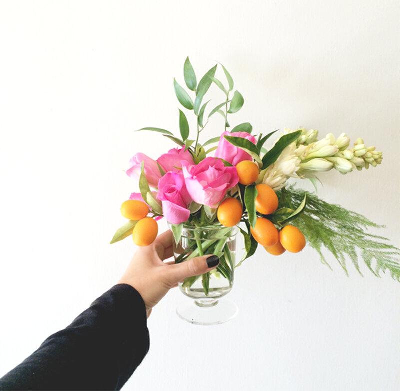 Hand Holding Flower Bouquet — Pink