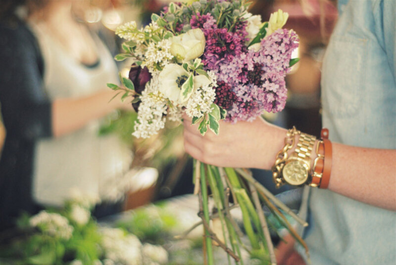 Hand Holding Flower Bouquet — Purple