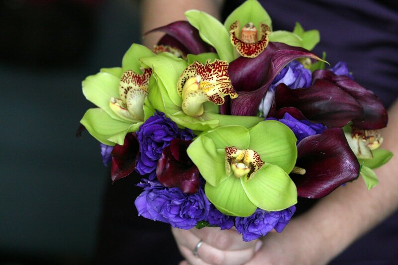 Hand Holding Flower Bouquet