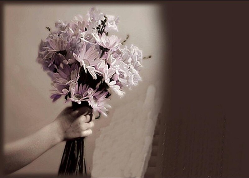 Hand Holding Flowers — Purple