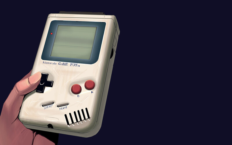 hand holding game boy