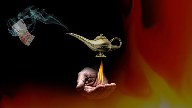 Hand Holding Genie Lamp