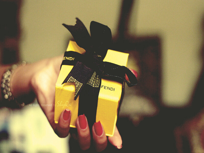 Hand Holding Gift Box
