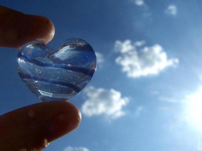 Hand Holding Glass Heart