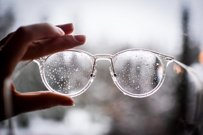 Hand Holding Glasses — White