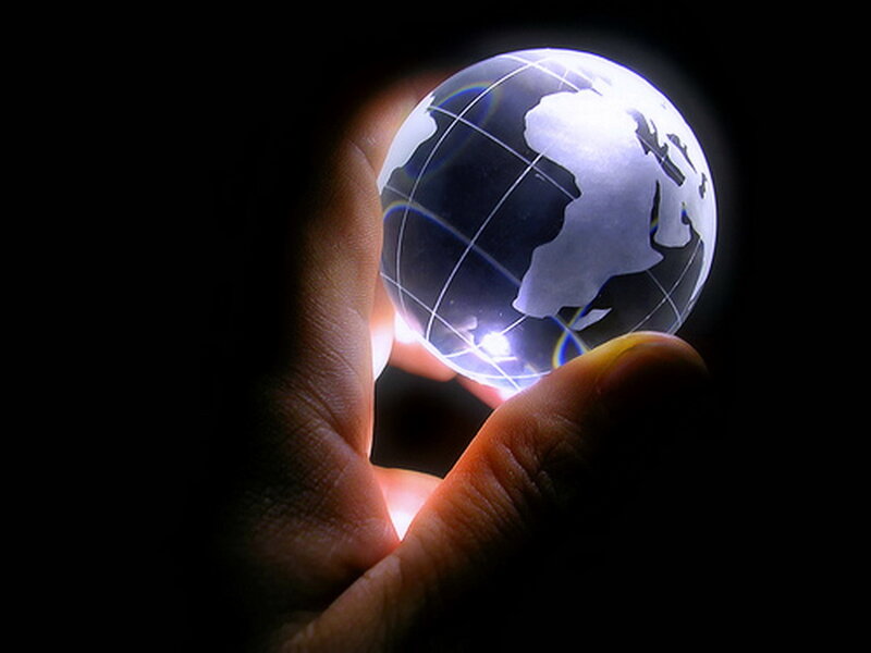 Hand Holding Globe — Black