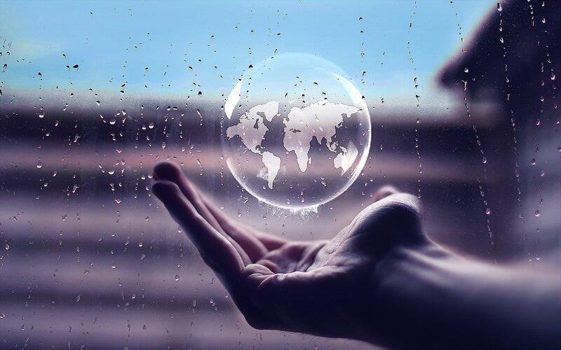 Hand Holding Globe — Blue, Contemplative, Digital Art