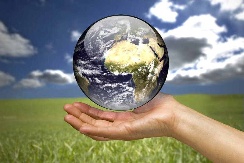 Hand Holding Globe — Green, Serene