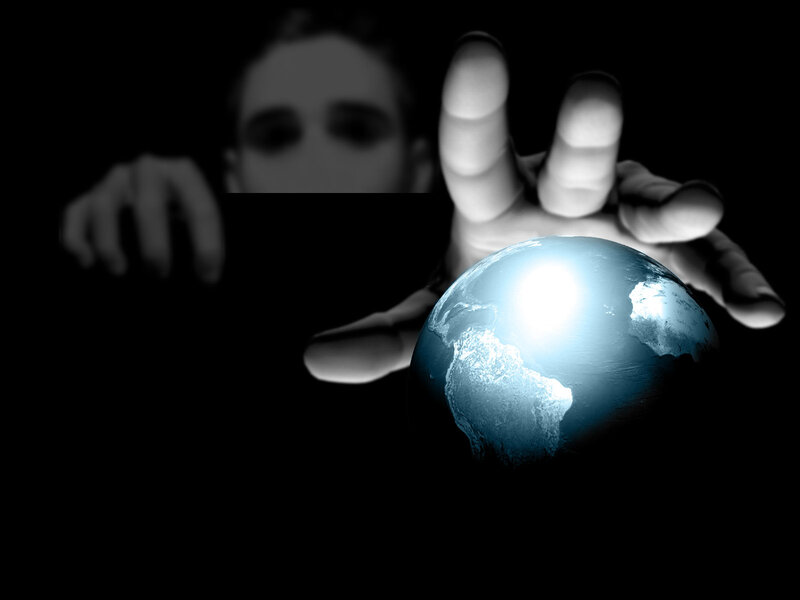 hand holding glowing earth