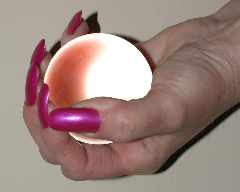 hand holding glowing object
