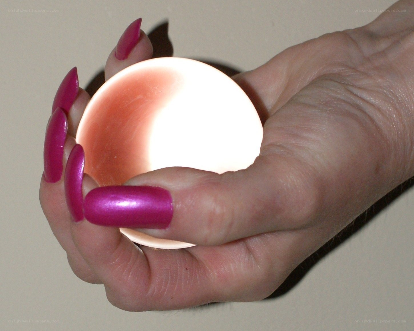 hand holding glowing object