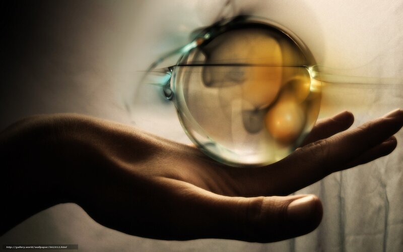 Hand Holding Glowing Orb — Brown
