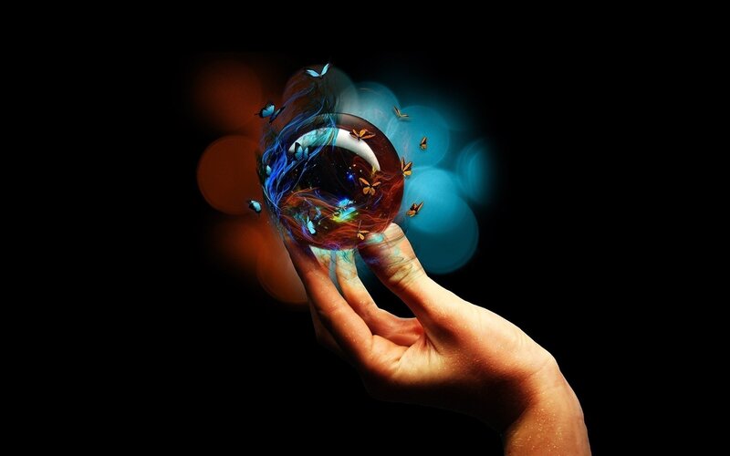 hand holding glowing orb