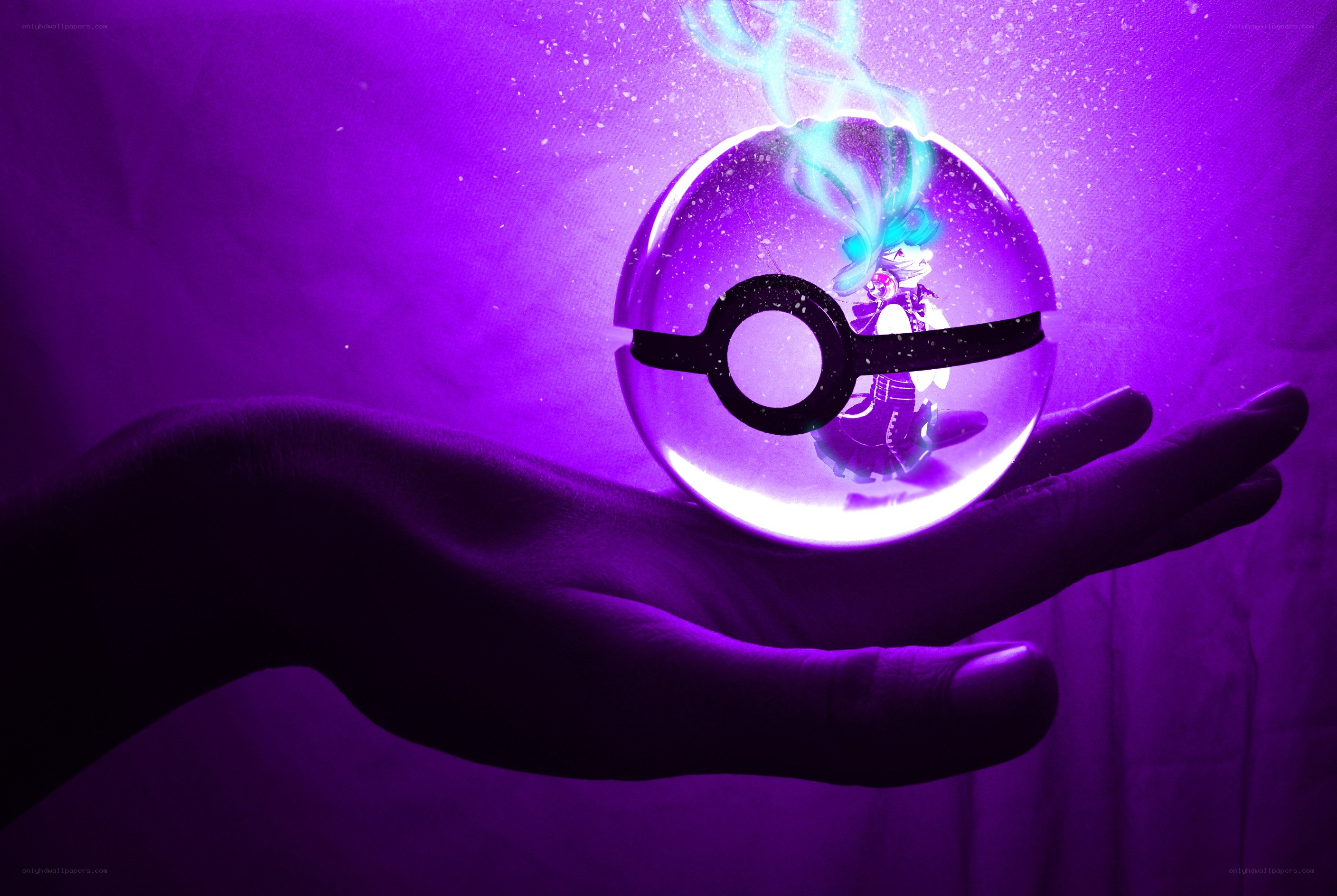 hand holding glowing pokeball