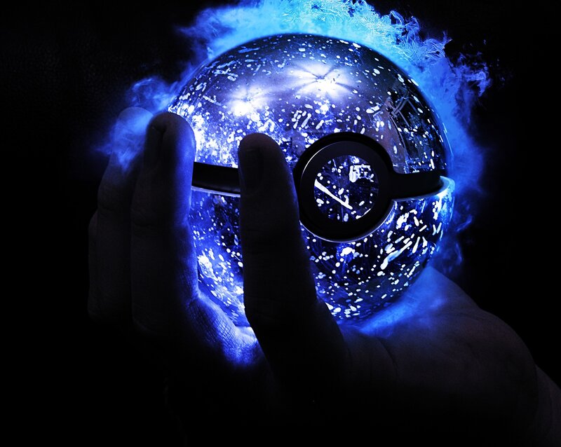 Hand Holding Glowing Sphere — Blue, Dramatic