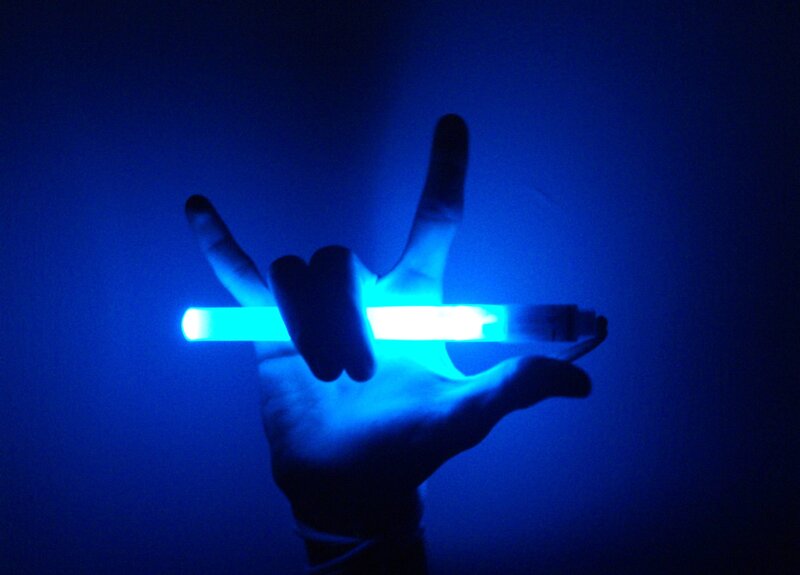 hand holding glowing stick