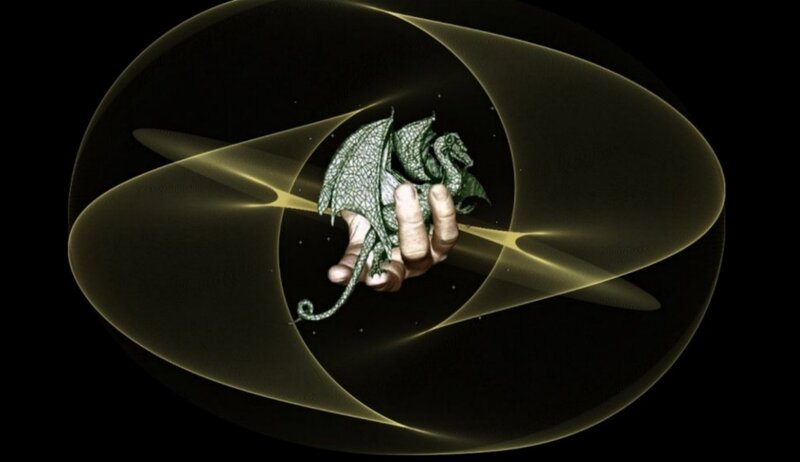 Hand Holding Green Dragon