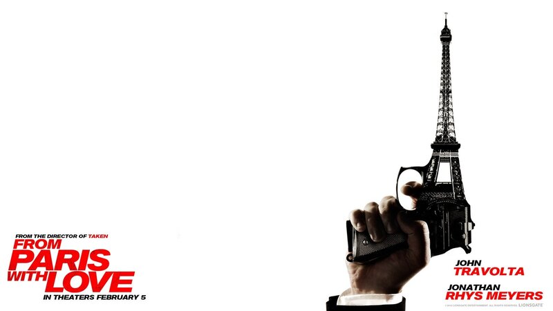 Hand Holding Gun Shaped Like Eiffel Tower