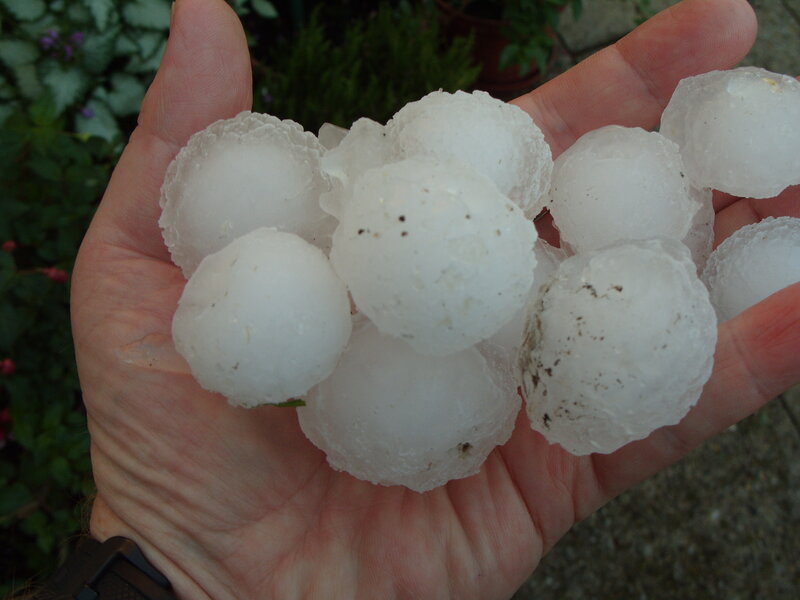 Hand Holding Hailstones