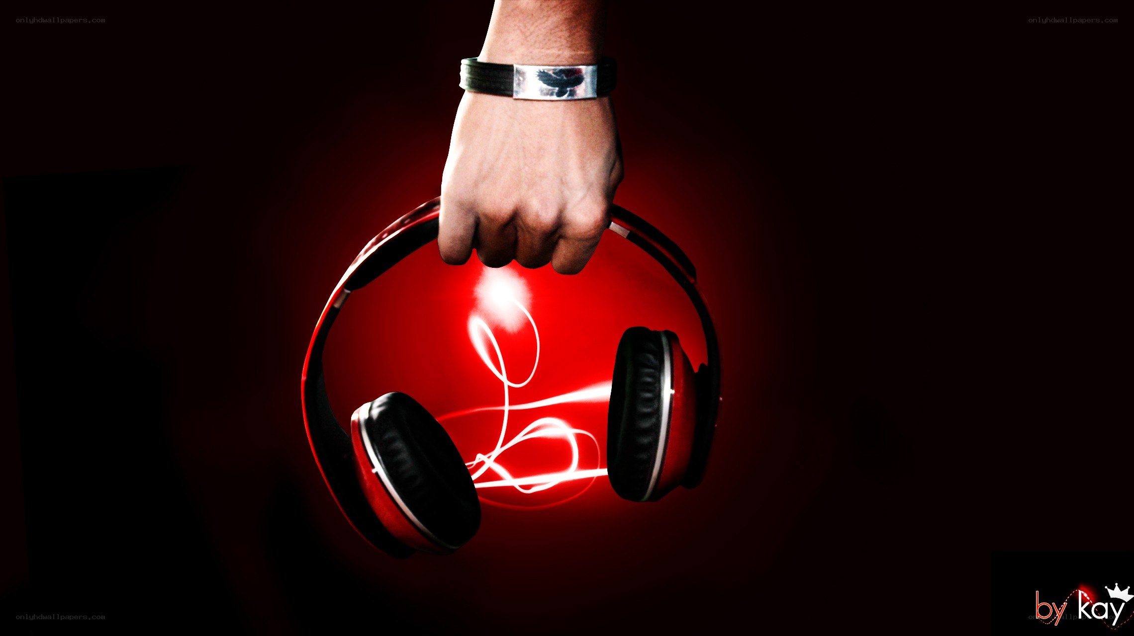 hand holding headphones