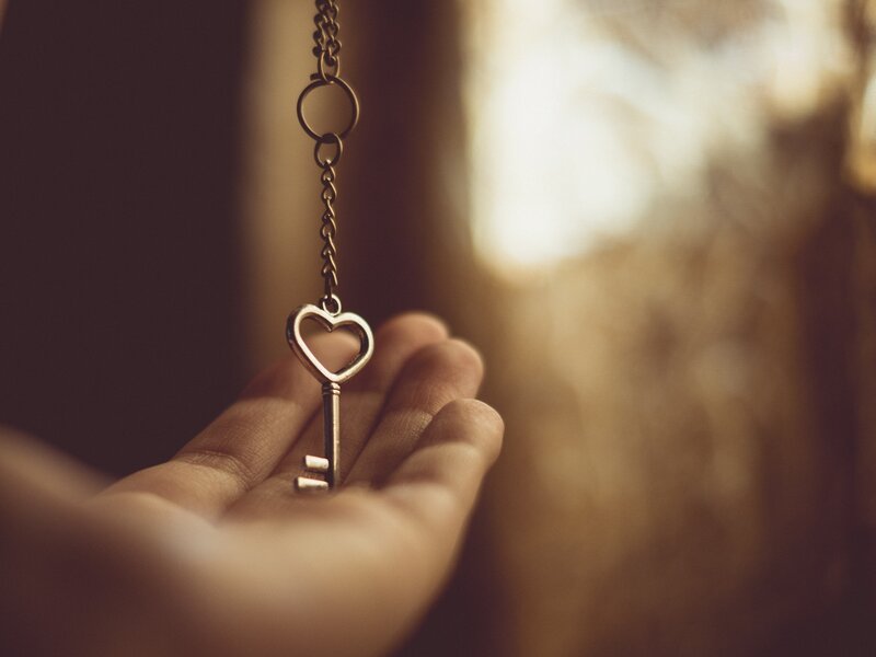 Hand Holding Heart Key