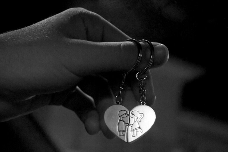 Hand Holding Heart Keychain