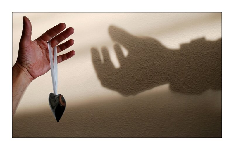 Hand Holding Heart Ornament