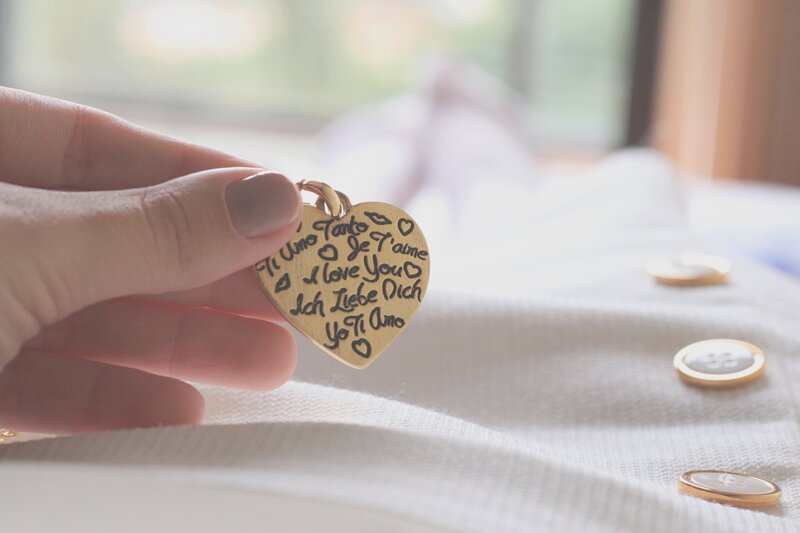 Hand Holding Heart Pendant — White
