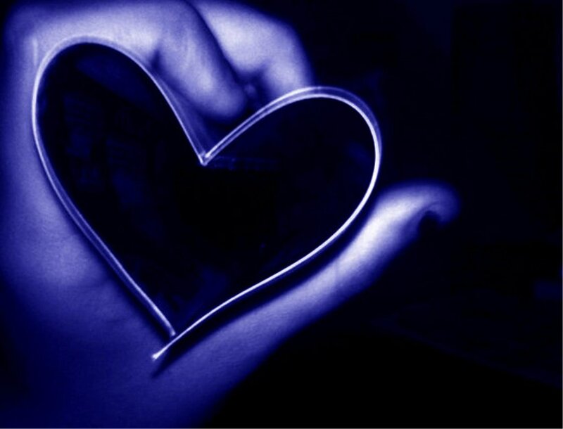Hand Holding Heart Shape