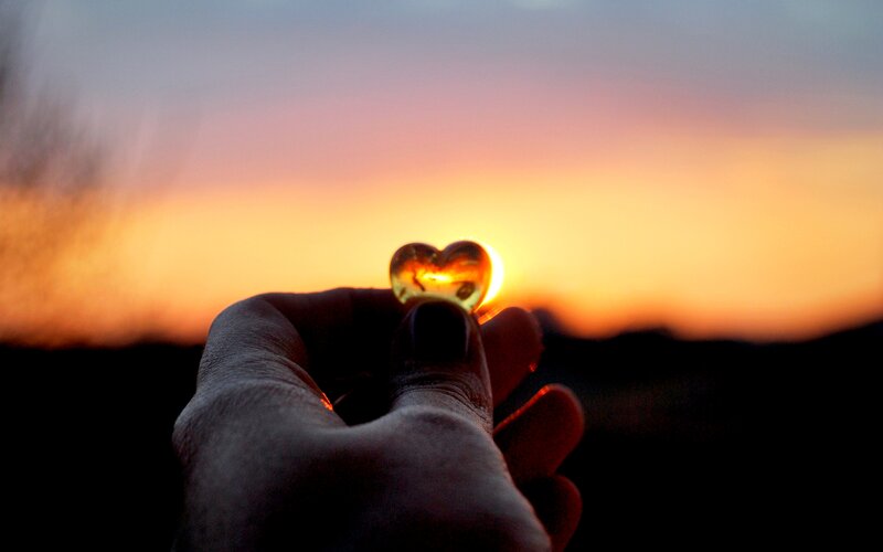 Hand Holding Heart-shaped Object