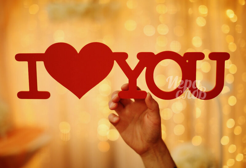 Hand Holding I Love You Sign