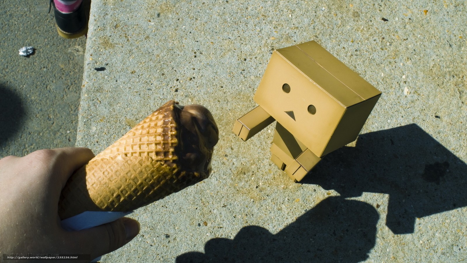 Hand holding ice cream cone