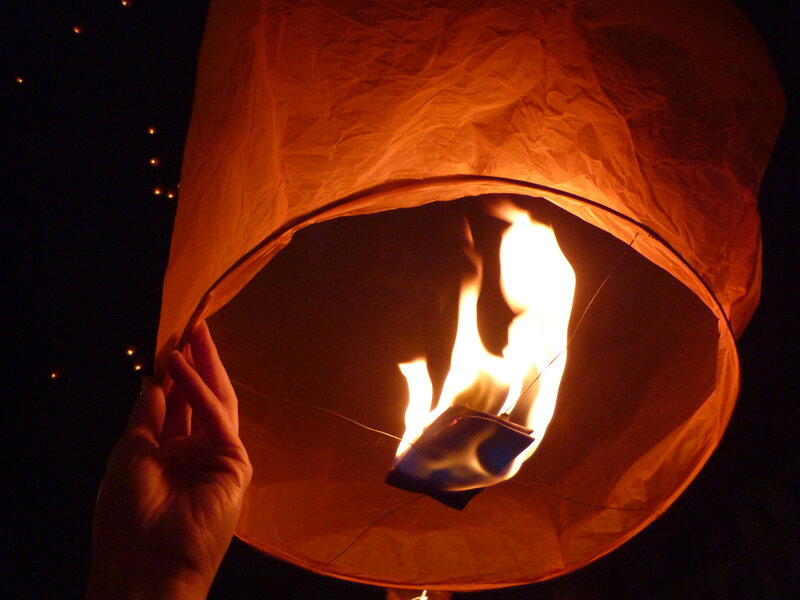 Hand Holding Lantern