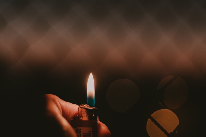 Hand Holding Lighter — Black, Dramatic, Night, Photograph, Flame