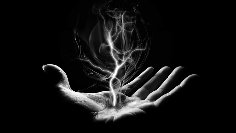 Hand Holding Lightning