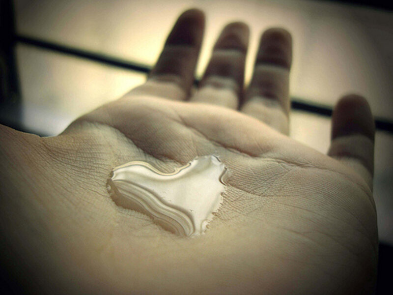 Hand Holding Liquid