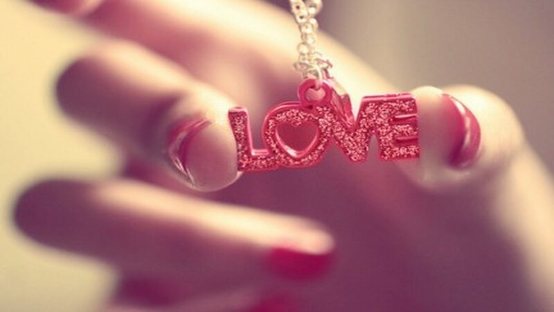 Hand Holding Love Pendant