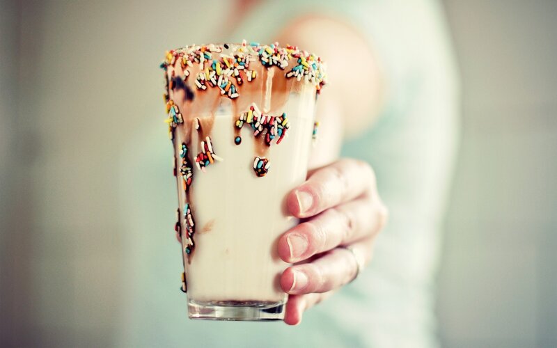 Hand Holding Milkshake — White