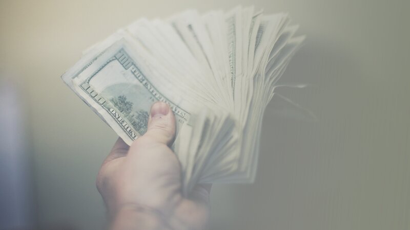 hand holding money