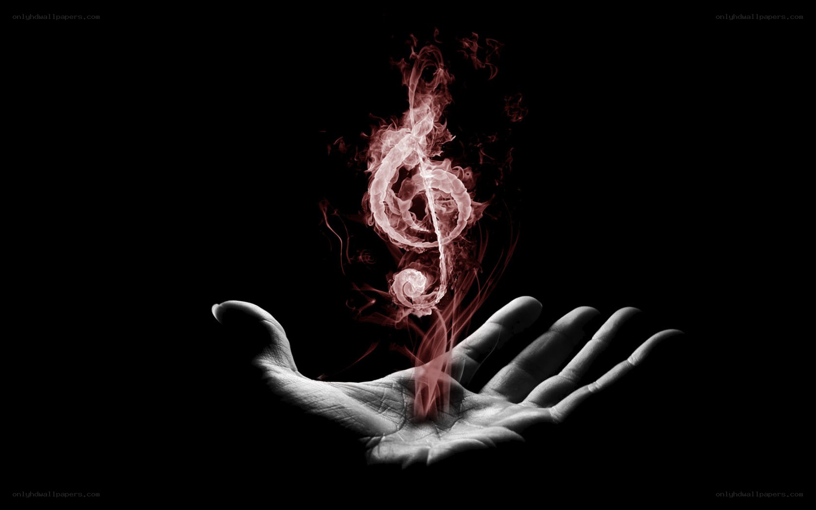 hand holding musical symbol