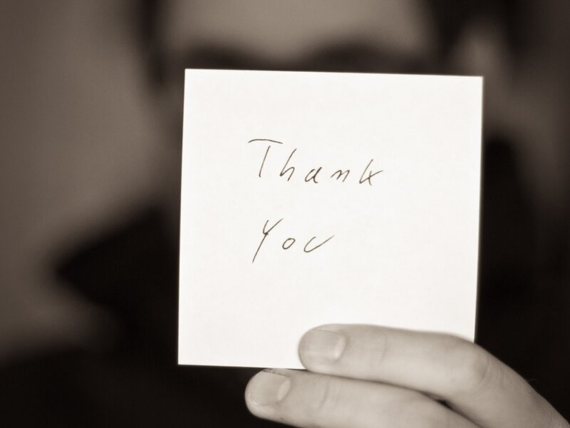 Hand Holding Note Card