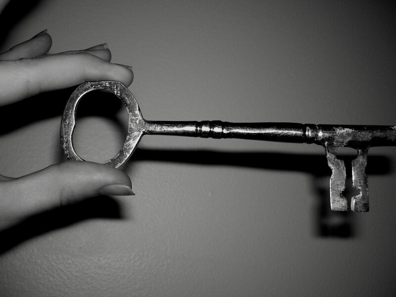 hand holding old key
