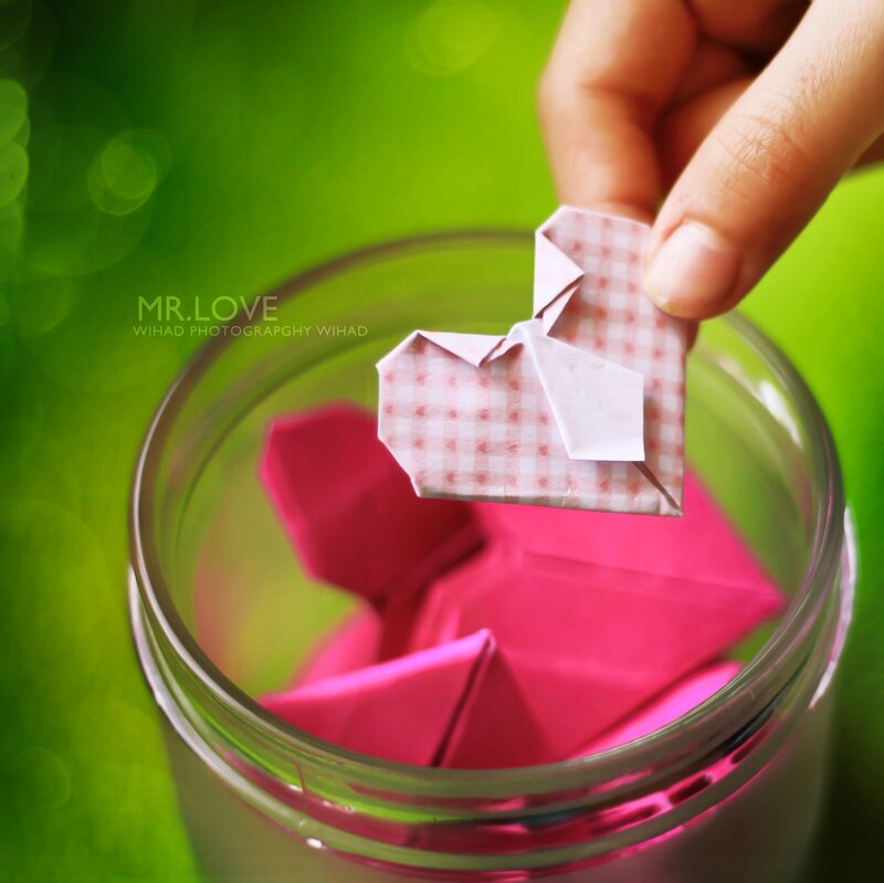 Hand Holding Origami Heart