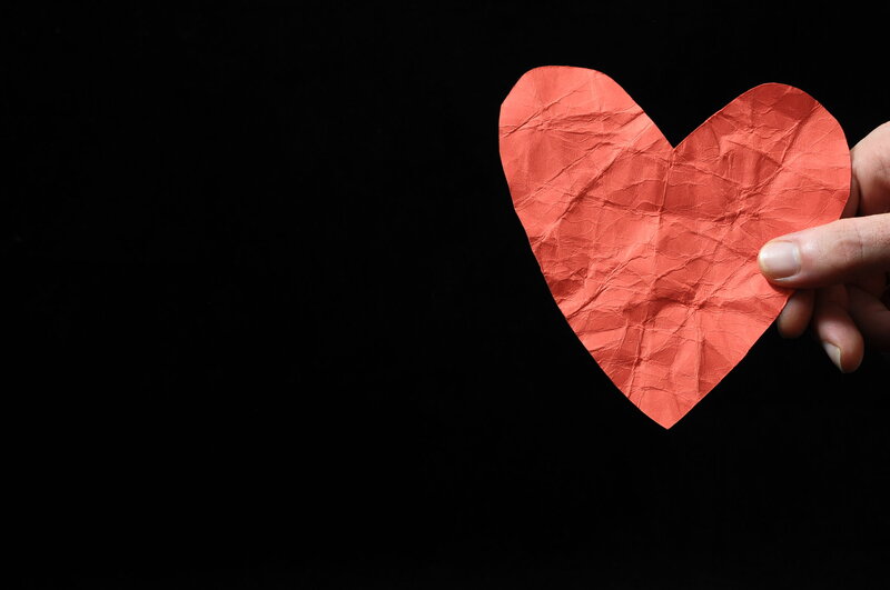 Hand Holding Paper Heart — Red, Dramatic