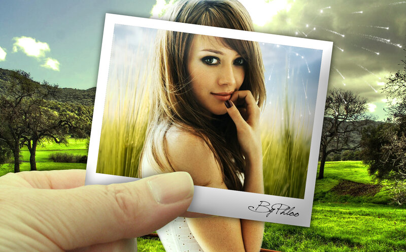 hand holding photo of woman