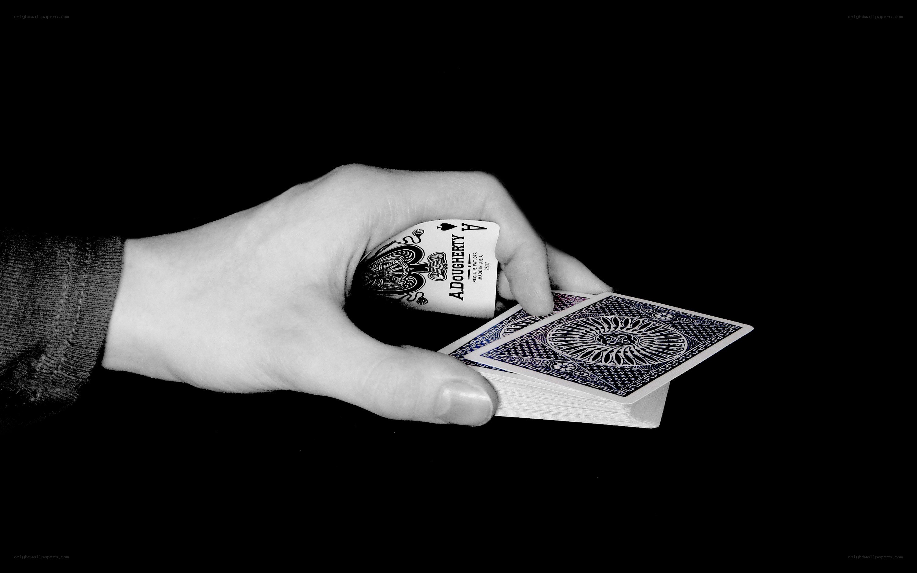 hand holding playing cards