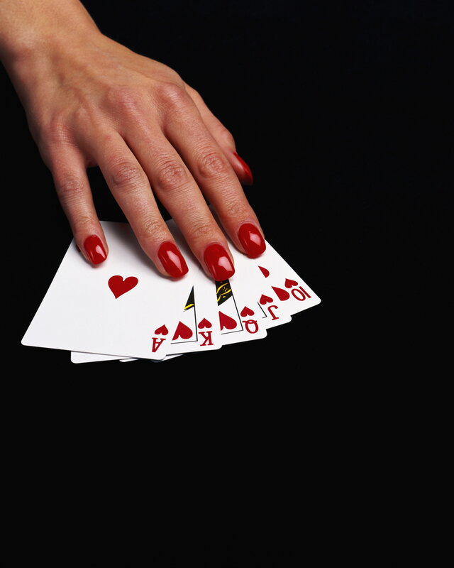 hand holding playing cards