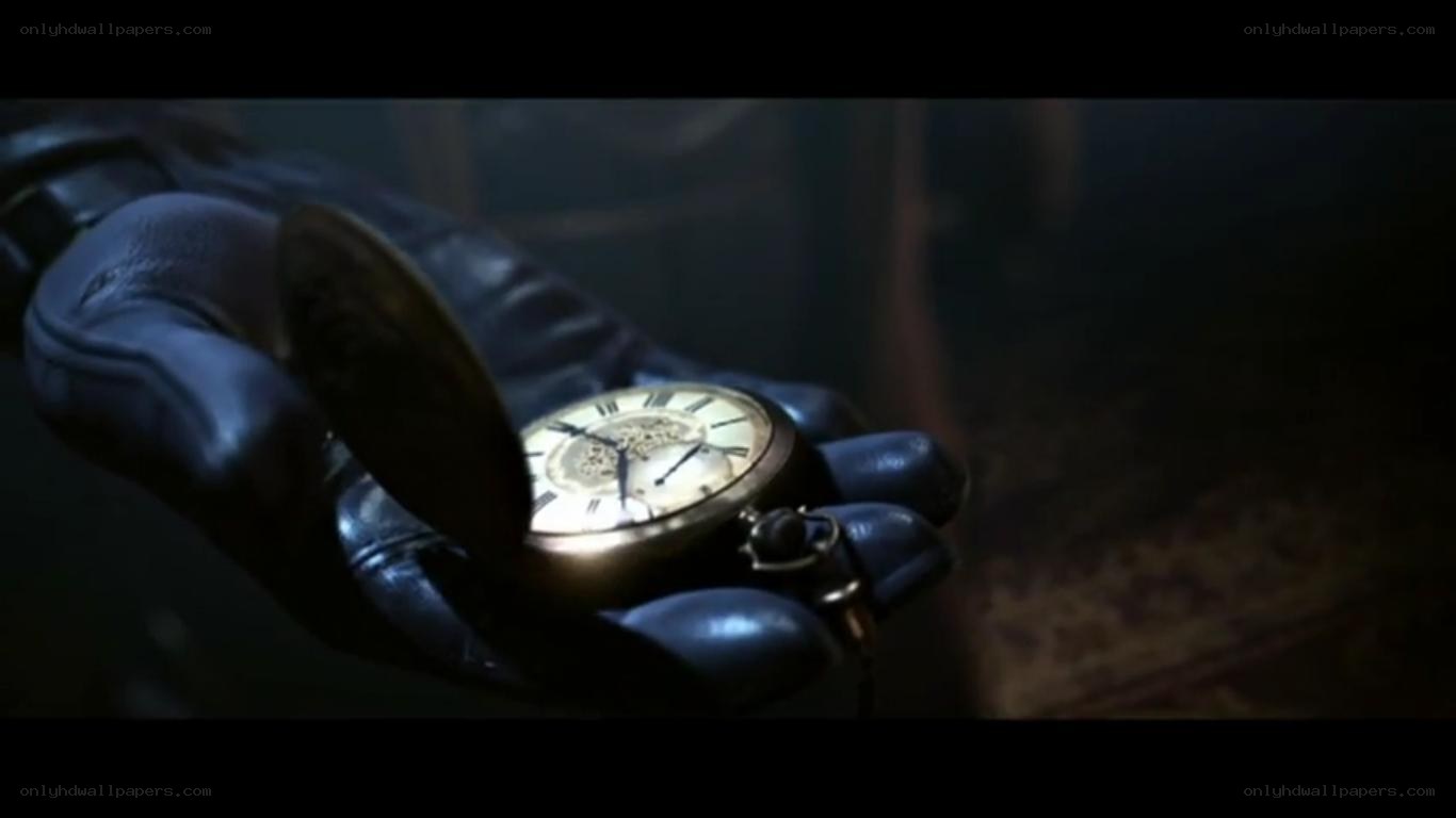 hand holding pocket watch